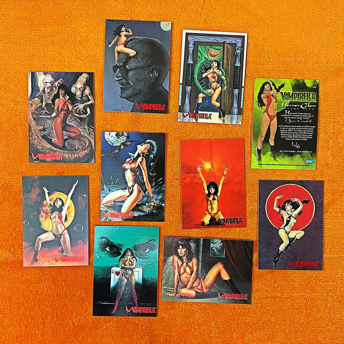 Collection of vintage-style posters featuring women in various poses on an orange background.